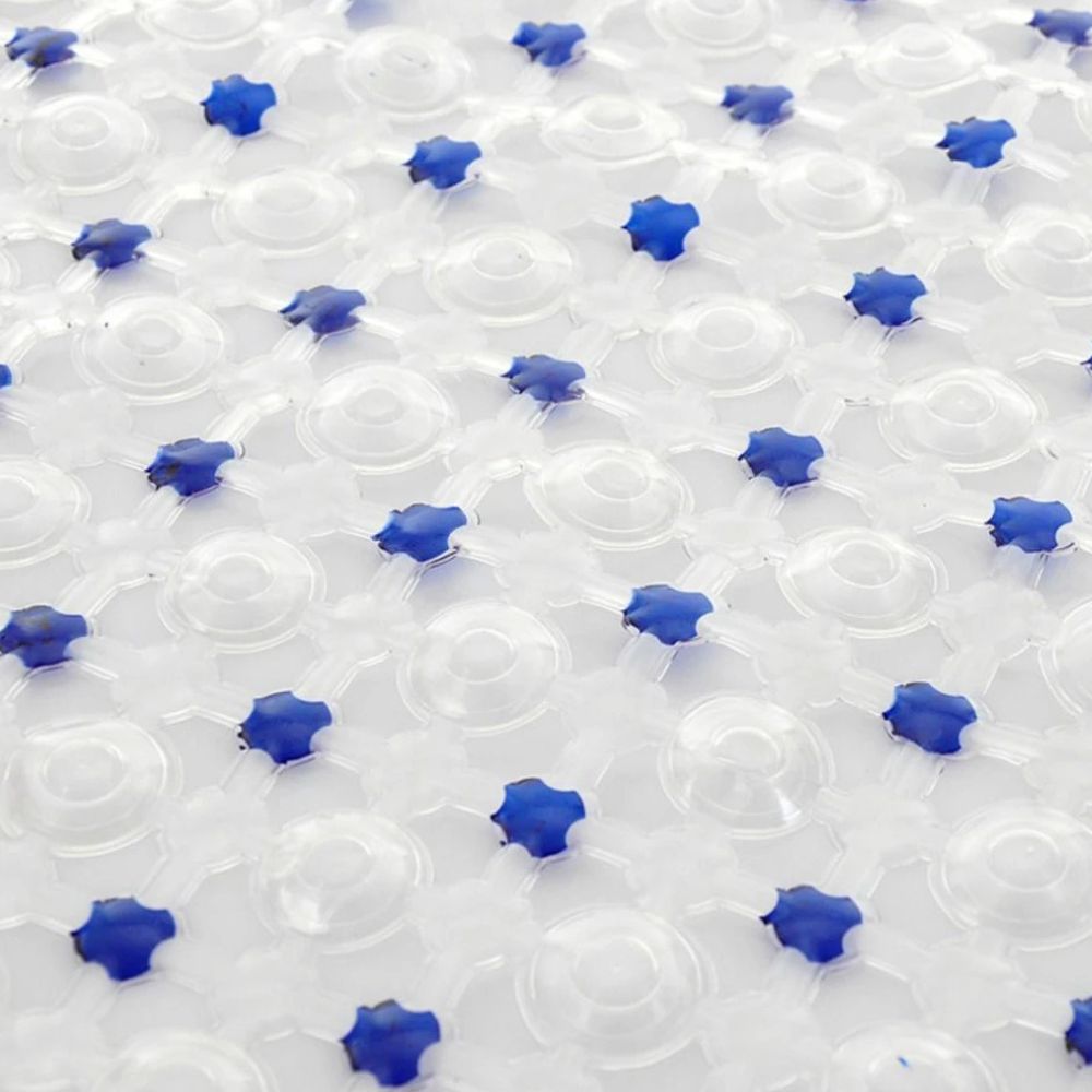 Clear plastic sheet with blue star-shaped objects on a white background