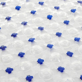 Clear plastic sheet with blue star-shaped objects on a white background